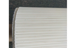 What is the reason for the filter cloth when the sludge is dewatered and pressed?